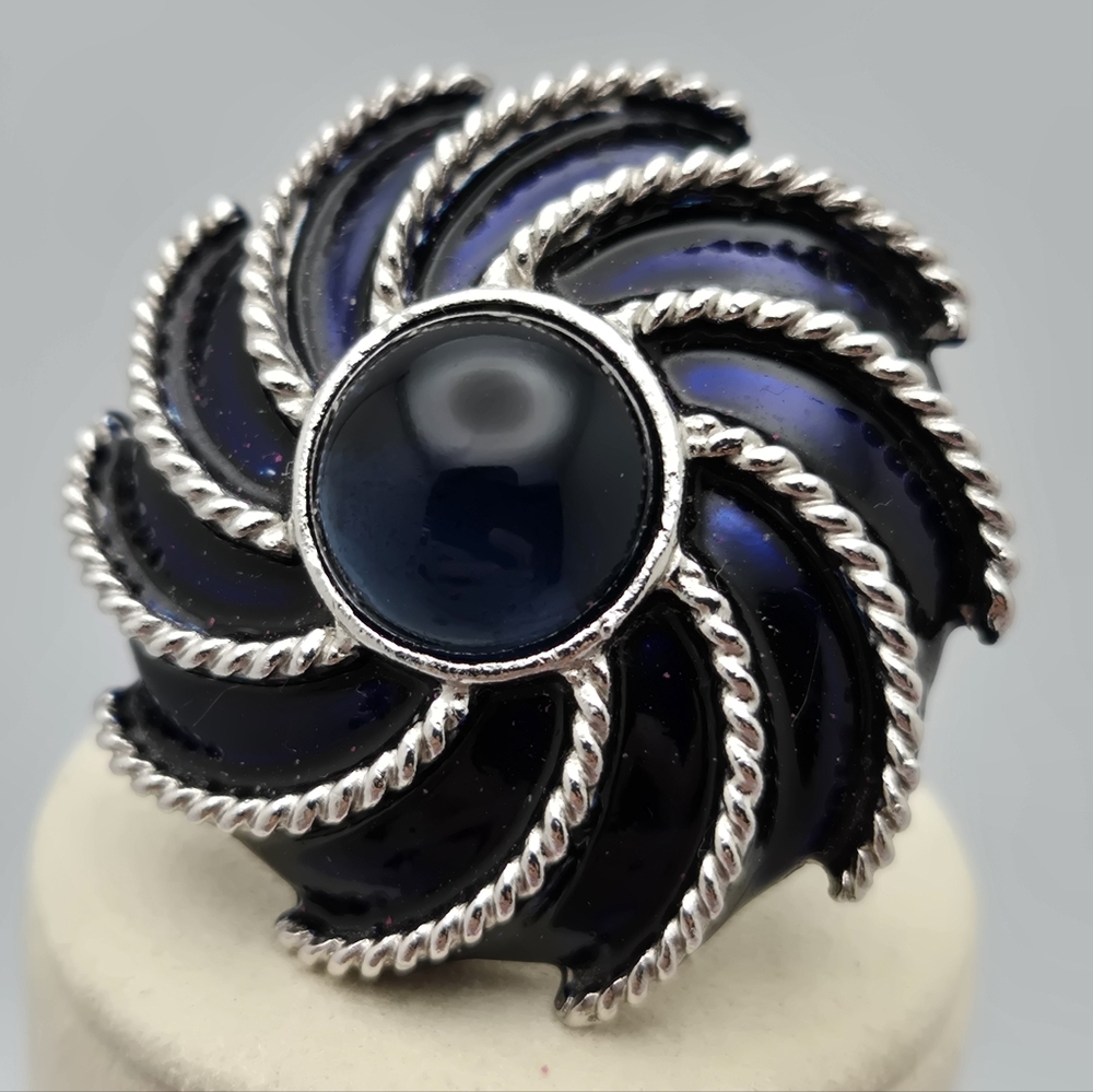 Avon Brooch Navy Blue Enamel Pinwheel Silver Tone Vintage Moonwind Piece
